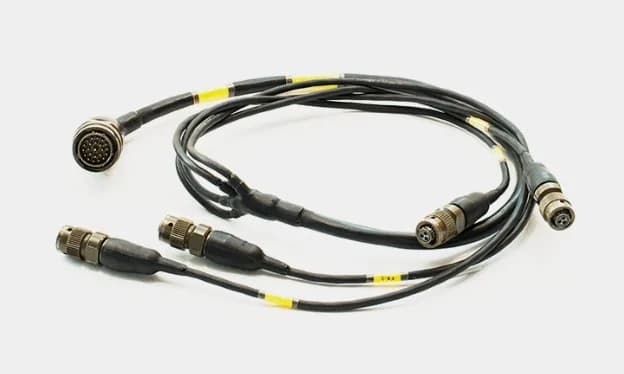 Overmolded cable assembly with multiple circular connectors and strain relief boots